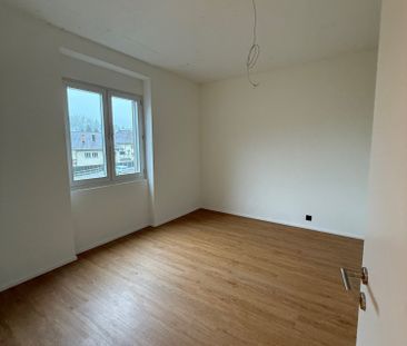 Moderne 2.5-Zimmer-Wohnung an zentraler Lage in Reinach - Photo 1