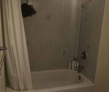 A private bedroom with a private bathroom available now - Photo 3