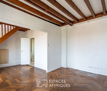 Duplex atypique en dernier étage - Photo 1