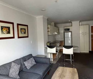 Cozy 1-Bedroom Studio with Covered Garage parking - Photo 1