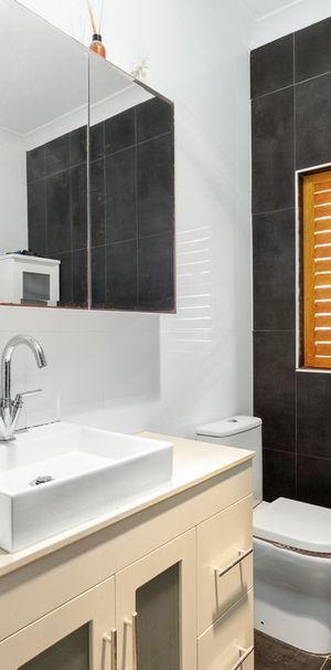 Spacious Four Bedroom Family Home with Large Backyard - Photo 1