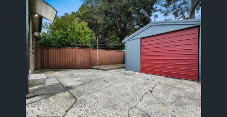 Contemporary 3-Bedroom Home with Garage - Photo 2