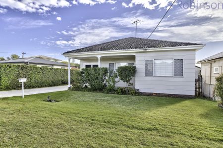 Fully renovated two bedroom plus sunroom home; the lawns are mowed for you! - Photo 4