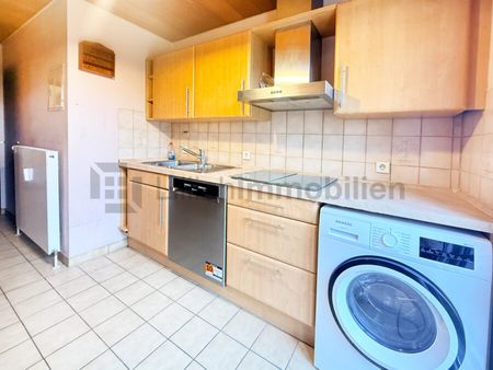 Wohnkomfort trifft Gartenfreude – 3-Zimmer-Wohnung mit Terrasse und Tiefgaragenstellplatz - Photo 3