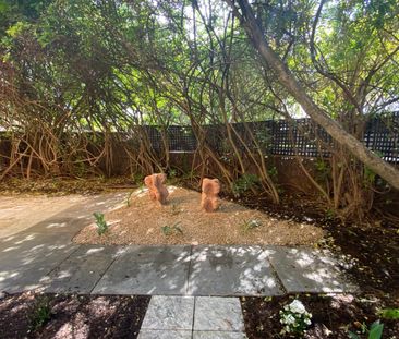 SPACIOUS ONE BR UNIT WITH LARGE PRIVATE GARDEN AND CARPORT - Photo 6