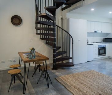 THE GLASS STUDIOS are sleek industrial living and are located in th... - Photo 4