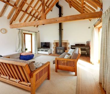 A superb restoration of a fine listed barn offering spacious and fl... - Photo 3