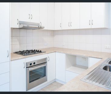 Spacious 3-Bedroom Home in a Convenient Brooklyn Park Location - Photo 4
