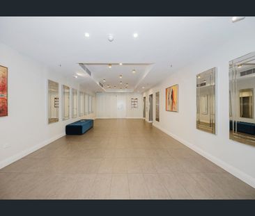 City at your Doorstep- Fully Furnished & Equipped with Gym - Photo 3