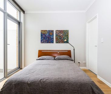 Stylish Apartment with Resort-Style Facilities in the Heart of Waterloo - Photo 2