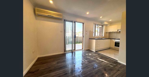 Available from 14/02/2026 New carpet,Freshly painted walls doors through out 3 bedroom townhouse with A/C - Photo 1