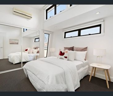 Striking Style, Sophisticated Living - Spacious Three-Level Townhouse! - Photo 4