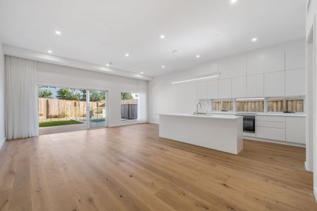 Coastal Living at Its Finest - Modern 3-Bedroom Duplex Steps from the Beach - Photo 5