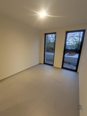 Energiezuinige nieuwbouwappartement met staanplaats en gemeenschappelijk zwembad - Photo 5