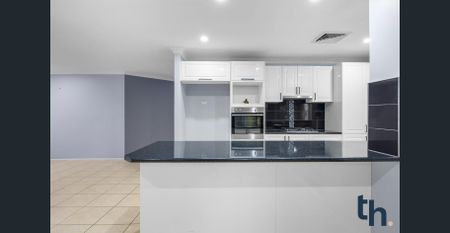 Stylish Family Home with Pool and Multiple Living Areas - Photo 5