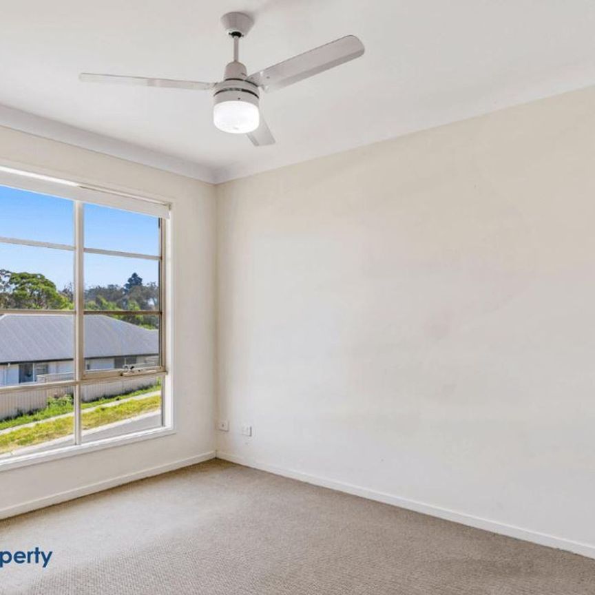 This upscale townhouse features open-concept living at its finest with a sophisticated, contemporary style. - Photo 1