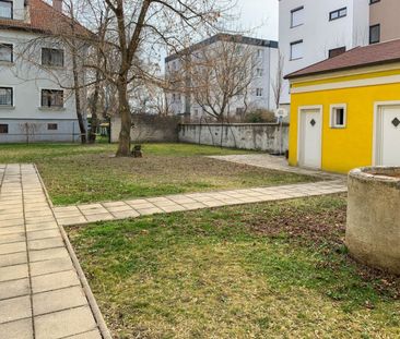Gemütliche DG-Wohnung in Bahnhofsnähe mit Carport & Gartenmitbenütz... - Foto 1