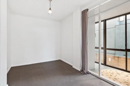 Peacefully positioned two bedroom plus sunroom apartment. - Photo 3