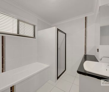 NEAT LOW MAINTENANCE 3 BEDROOM HOME WITH LOCK UP GARAGE - Photo 5