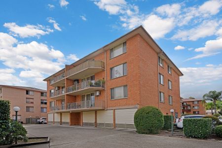 Neat & Tidy Unit with Access to Pool & Tennis Court - Photo 3