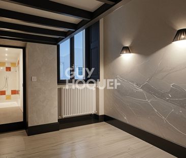 Centre historique : Grand T2 de 66 m² - Photo 2