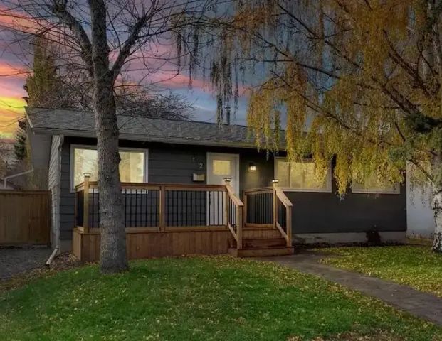 Renovated 2 Bedroom and 1 Bath Basement Suite with Large Windows: Legal Suite | 12 Hardisty Place Southwest, Calgary - Photo 1