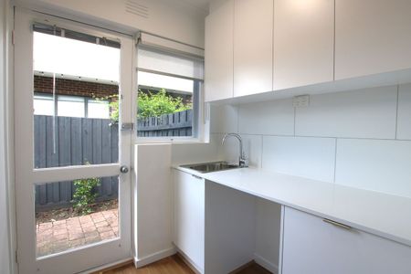 Newly Renovated 3-Bedroom Unit - Photo 4