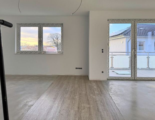 Ihr neues Zuhause: Neubau-Penthousewohnung mit Balkon inmitten von Remels - Uplengen - Foto 1