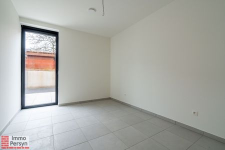 Gelijkvloers nieuwbouwappartement met 2 slaapkamers, terras en tuintje - Photo 3