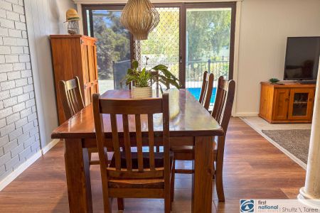 Stylish Family Home with Backyard Paradise - Photo 2