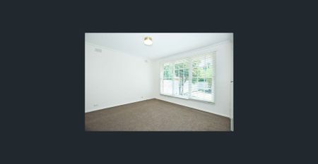 TWO BEDROOM FRONT UNIT WITH LARGE FRONT GARDEN AREA - Photo 2