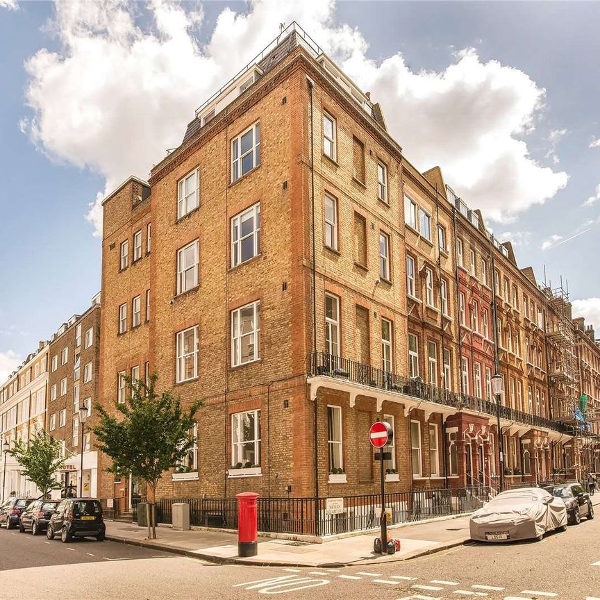 Double aspect two bedroom flat on a popular garden square in Earl's Court. - Photo 1