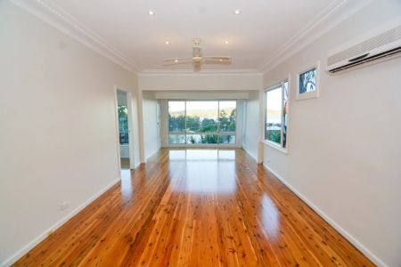 Conveniently Located Cottage with Captivating Water Views - Photo 2