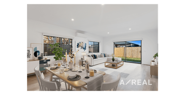 Modern 4-Bedroom Family Home in Weir Views - Photo 1