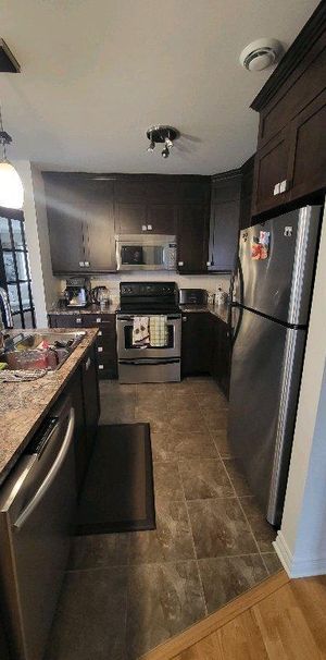 🏠 Coup de cœur assuré – Condo 4½ | 1 250 pi² | Blainville - Photo 1