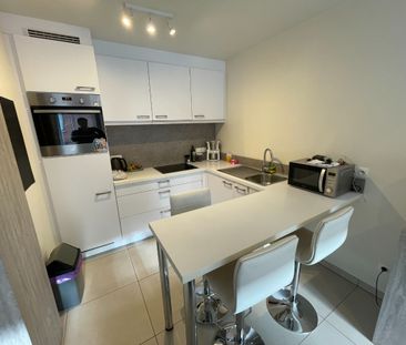 Appartement met 2 slaapkamers, staanplaats én ruim terras. - Photo 4
