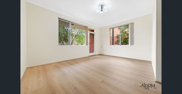 Updated Two-Bedroom Unit with Balcony & Lock-Up Garage - Photo 1