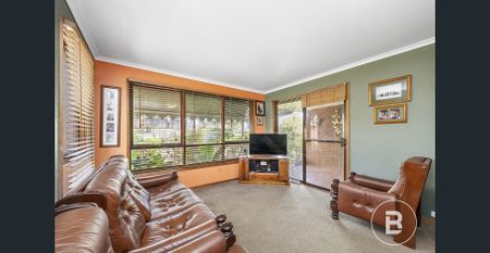 WELL KEPT FOUR BEDROOM HOME IN GREAT LOCATION - Photo 2