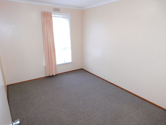 SPOTLESSLY CLEAN TWO BEDROOM UNIT CLOSE TO SHOPS, SCHOOLS AND TRANSPORTATION - Photo 1