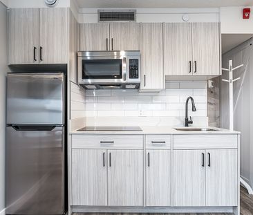 Bachelor Suites Available, ALL UTILITIES INCLUDED! - Photo 2