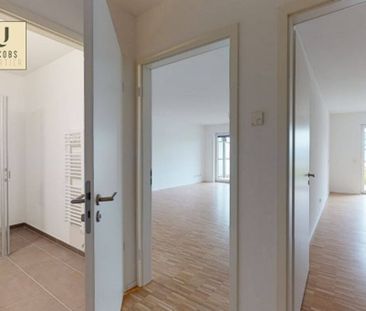 Helle 2-Zimmer-Wohnung mit Einbauküche in urbaner Lage - Foto 1