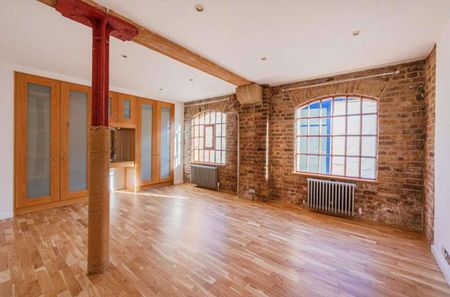 An exceptionally spacious 2 bedroom apartment situated on the second floor (with lift and stair access) of this fine, warehouse conversion, located in the heart of Wapping. - Photo 3