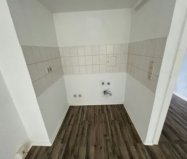 Helle Erdgeschosswohnung mit Dusche, Küche & Garderobenplatz - Photo 1