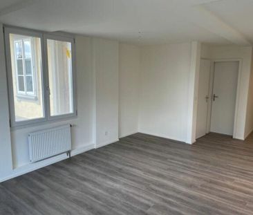 Modern renovated 3.5-room apartment on the ground floor - Photo 1