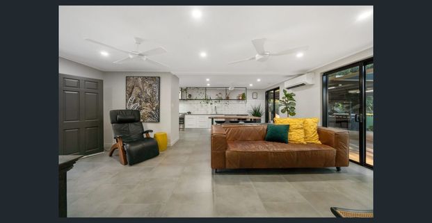 Family Luxury in the Heart of Mundingburra – Four-Bedroom Home with Pool & Solar Power! - Photo 1