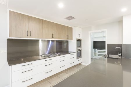 Modern 4 Bedroom + Study Home with Three Living Areas - Photo 3