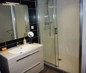 Appartement avec 2 chambres et balcon, à proximité des commerces et... - Photo 6