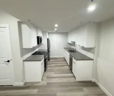 Modern Legal Basement Suite | 556 Rowmont Boulevard Northwest, Calgary - Photo 1
