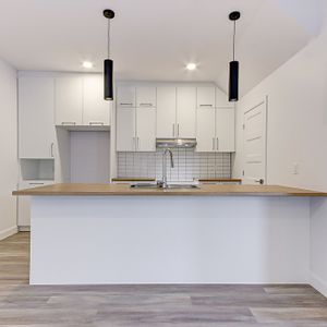 Grand 4 1/2 Au Rez-de-jardin - Photo 3