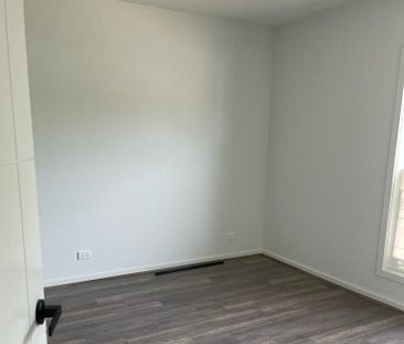 Family Home with Modern Comforts and Double Garage - Photo 3